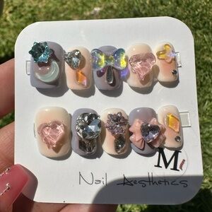 Pink and Purple Press-On Nails with 3D Floral and Glitter Accents